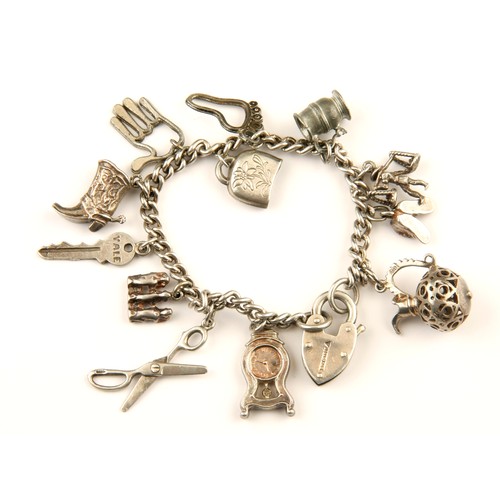 294 - A SILVER CHARM BRACELET