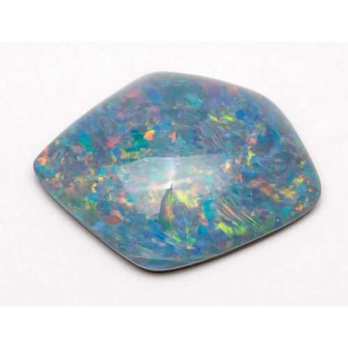 310 - AN UNSET NATURAL OPAL 24 CARATS