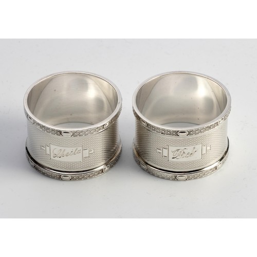 1079 - A PAIR OF GEORGE V SILVER NAPKIN RINGS, ERNEST W.HAYWOOD, BIRMINGHAM, 1924