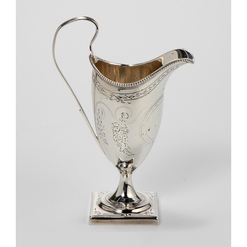 1015 - A GEORGE III SILVER MILK JUG, MAKERS MARKS RUBBED, LONDON, 1787