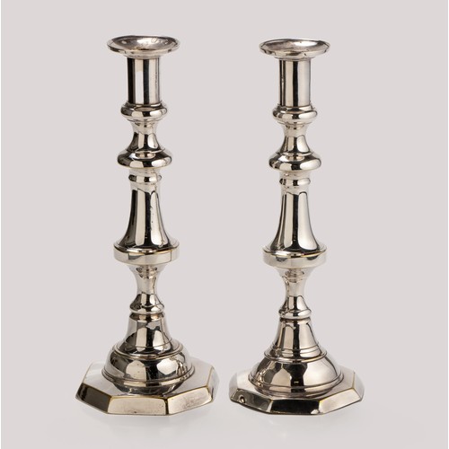 1137 - A PAIR OF ELECTROPLATED CANDLESTICKS