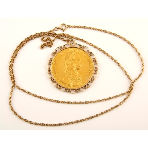 300 - A GOLD AUSTRIAN COIN ON CHAIN