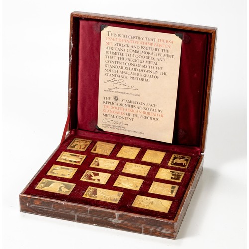 932 - A CASED SET OF GOLD STAMPS