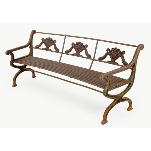 947 - A CAST IRON GARDEN BENCH