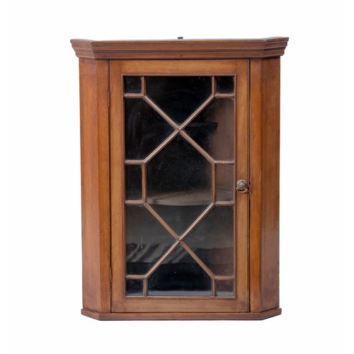 51 - A GEORGE III MAHOGANY HANGING CORNER CUPBOARD