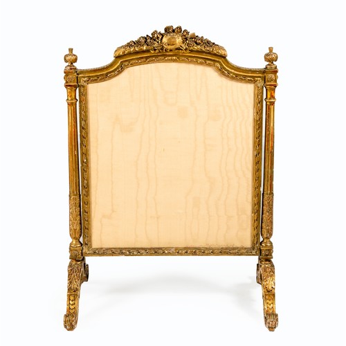 89 - A VICTORIAN GILTWOOD FIRE SCREEN