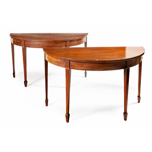 321 - A PAIR OF GEORGE III MAHOGANY DEMI-LUNE TABLES