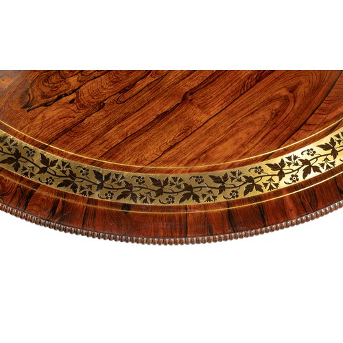 336 - A REGENCY ROSEWOOD AND BRASS INLAID CENTRE TABLE