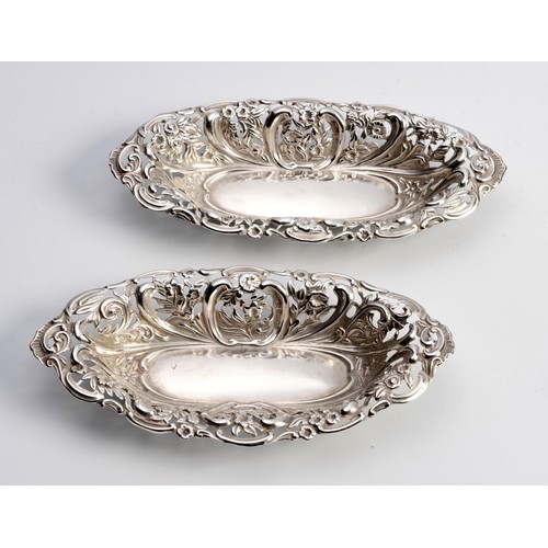 1057 - A PAIR OF EDWARD VII SILVER BON-BON DISHES, HENRY MATTHEWS, BIRMINGHAM, 1903