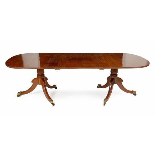 333 - A REGENCY MAHOGANY EXTENDING DINING TABLE