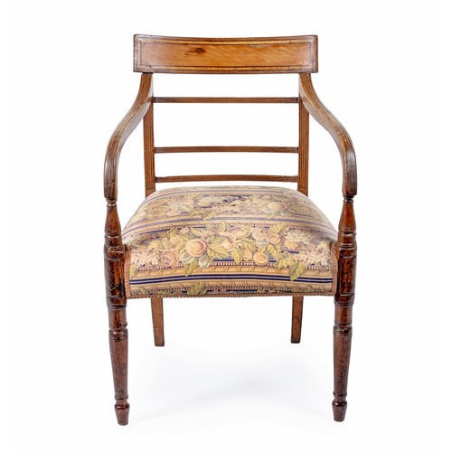 69 - A REGENCY MAHOGANY ARMCHAIR