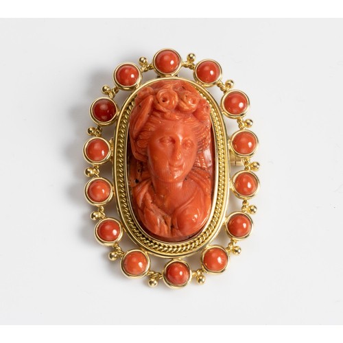 452 - A CORAL BROOCH/PENDANT