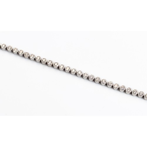 468 - A DIAMOND TENNIS BRACELET