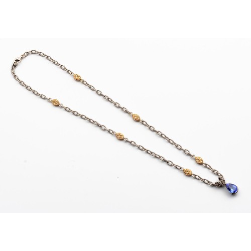 472 - A TANZANITE AND DIAMOND PENDANT NECKLACE