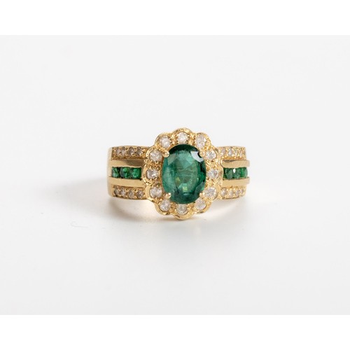 483 - AN EMERALD AND DIAMOND RING