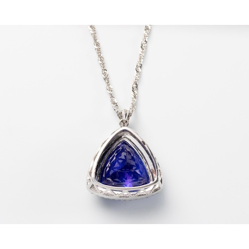 548 - A TANZANITE AND DIAMOND PENDANT