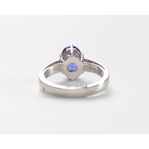 553 - A TANZANITE AND DIAMOND RING