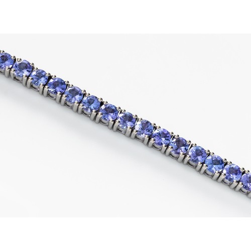 555 - A TANZANITE TENNIS BRACELET