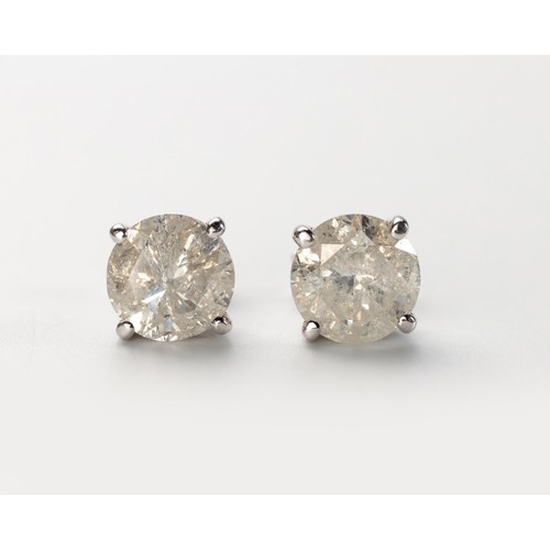 559 - A PAIR OF DIAMOND EAR STUDS