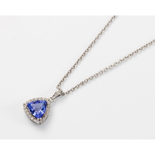 562 - A TANZANITE AND DIAMOND PENDANT