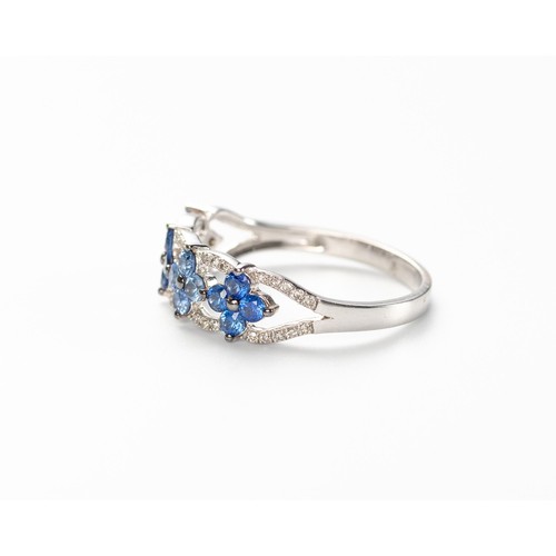 569 - A SAPPHIRE AND DIAMOND RING