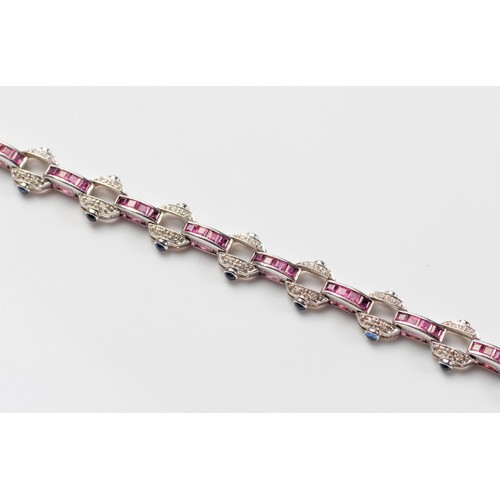 571 - A RUBY, DIAMOND AND SAPPHIRE BRACELET