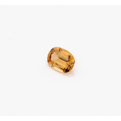 615 - AN UNMOUNTED OVAL MIXED-CUT HESSONITE GARNET