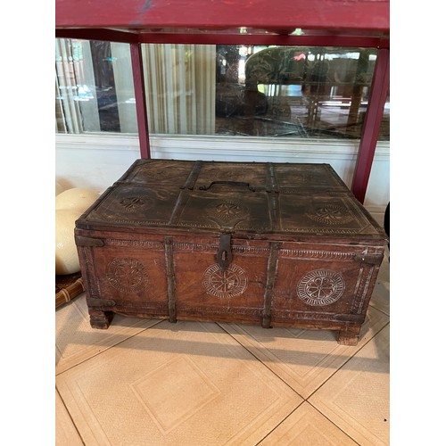 768 - A METAL-BOUND AND CARVED OAK STORAGE BOX, 19TH CENTURY