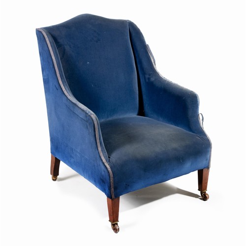 771 - AN UPHOLSTERED ARMCHAIR