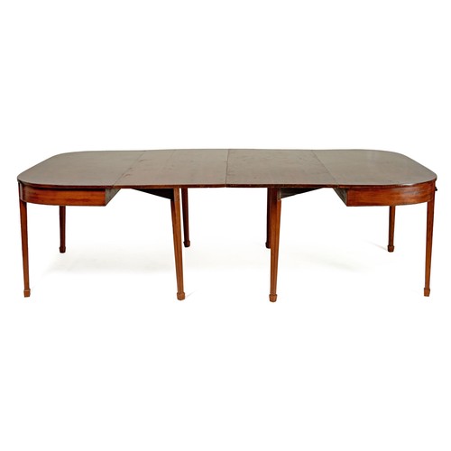 522 - A GEORGE III MAHOGANY EXTENDING DINING TABLE