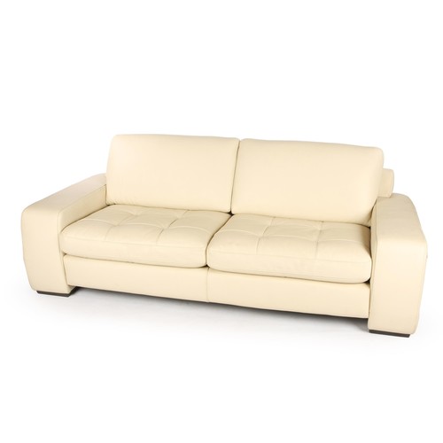 781 - A CREAM COLORED TWO-SEATER SOFA, MODERN