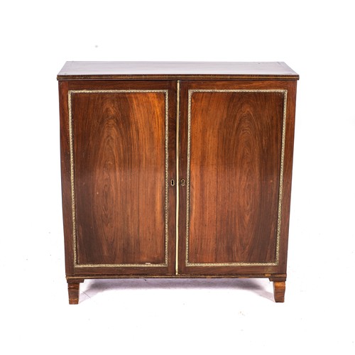 529 - A REGENCY ROSEWOOD TWO-DOOR CABINET