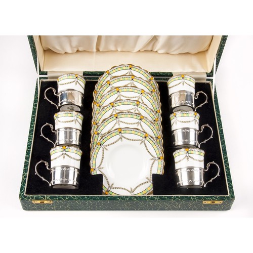 440 - AN AYNSLEY CASED DEMITASSE SET, 1935