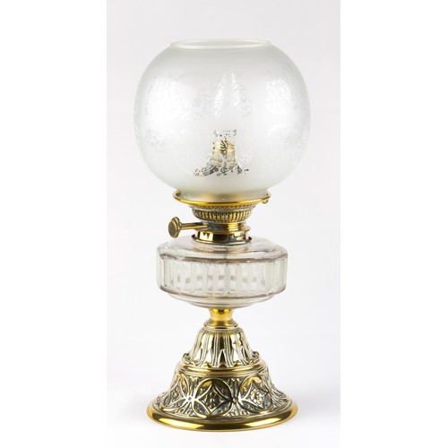 425 - A BRASS AND GLASS OIL TABLE LAMP