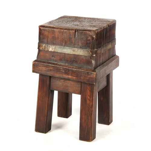 576 - A GERMAN STAINED OAK BUTCHERS BLOCK, 19TH CENTURY