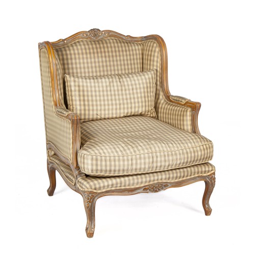 790 - A FRENCH-STYLE UPHOLSTERED WING BACK ARMCHAIR