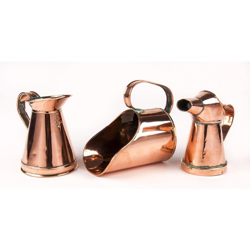 295 - TWO COPPER MEASURING JUGS