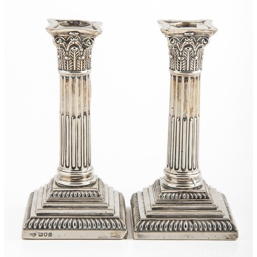 133 - PAIR CORINTHIAN COLUMN SILVER CANDLESTICKS