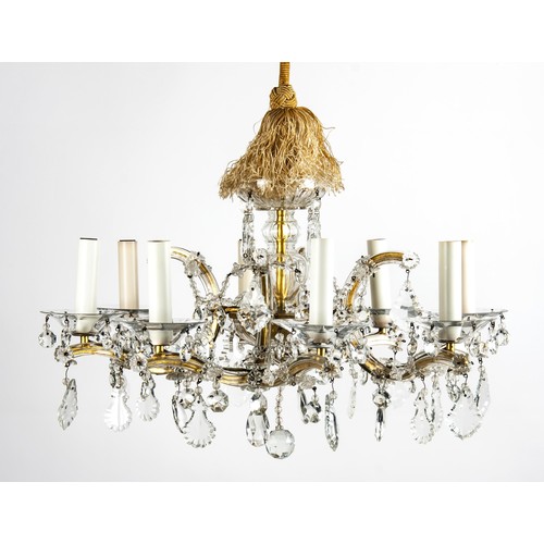 794 - A BRONZE METAL AND CRYSTAL CHANDELIER