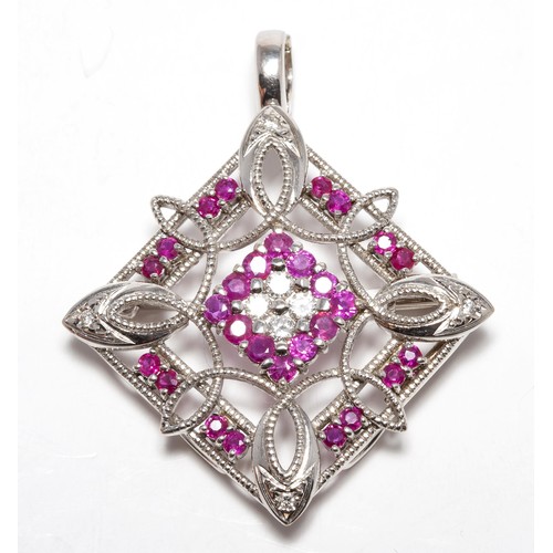 954 - A RUBY AND DIAMOND BROOCH