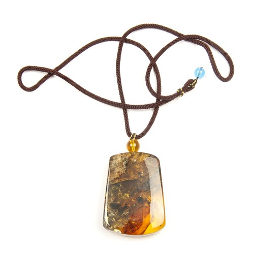 973 - AN AMBER PENDANT