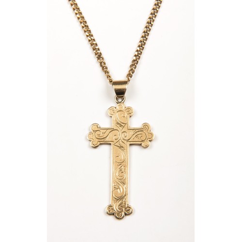 981 - A GOLD CROSS AND CHAIN