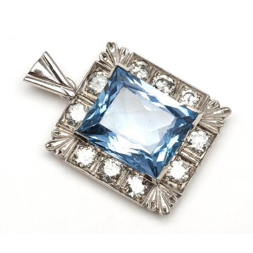 1011 - A TOPAZ AND DIAMOND PENDANT