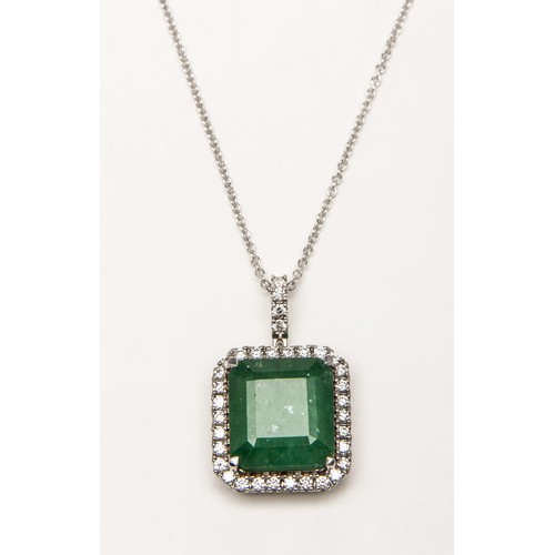 1027 - AN EMERALD AND DIAMOND PENDANT