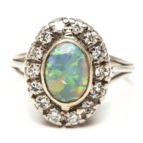 1052 - AN OPAL AND DIAMOND RING