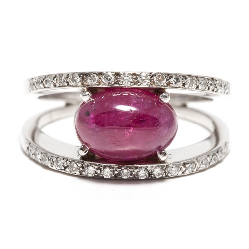 1056 - A RUBY AND DIAMOND DRESS RING