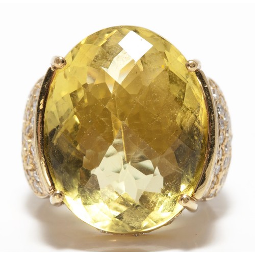 1060 - A GEMSTONE AND DIAMOND RING CIRCA 1980