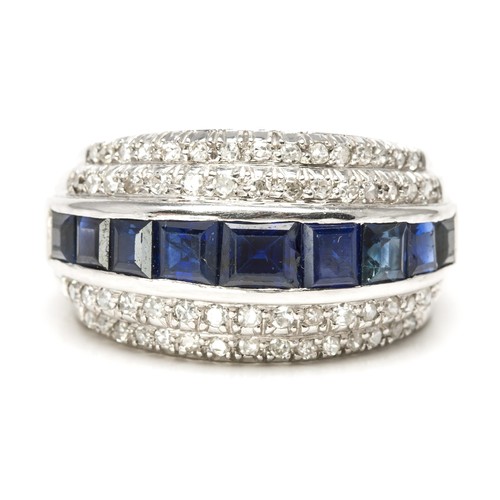 1068 - A SAPPHIRE AND DIAMOND DRESS RING