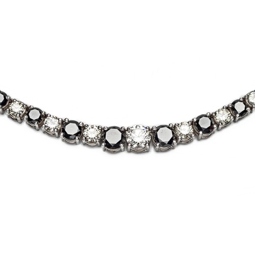 1033 - A BLACK AND WHITE DIAMOND SINGLE-LINE NECKLACE