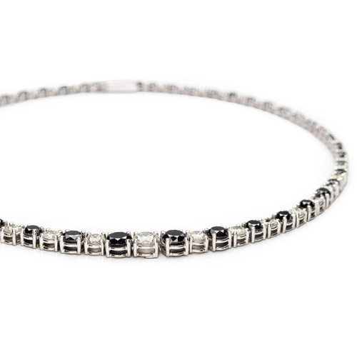 1033 - A BLACK AND WHITE DIAMOND SINGLE-LINE NECKLACE